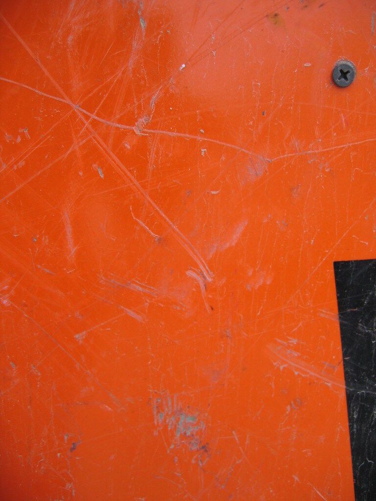 Orange with a black corner. The picture is the corner.