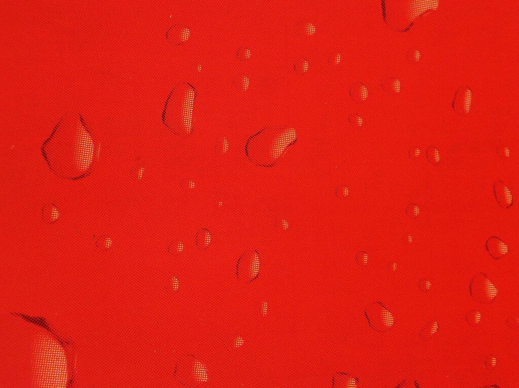 Red and wet. The drops add texture, and the red still fills your mind.