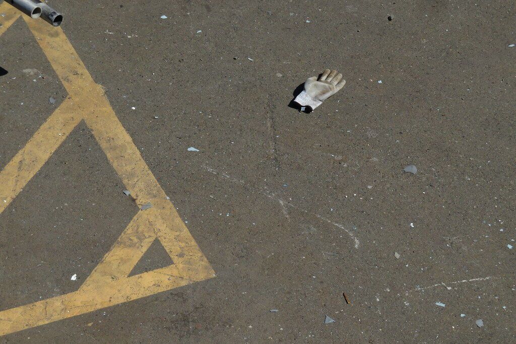 A painted line on asphalt, filling the frame.