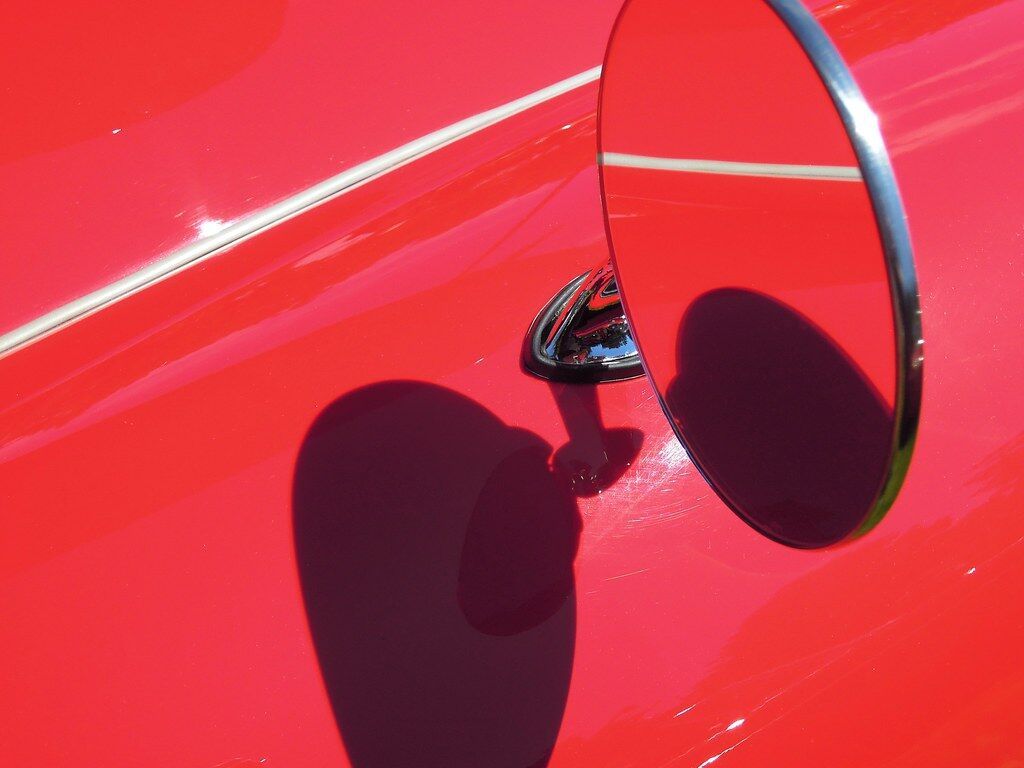 A red car and its mirror. It’s a good picture of a car, so it counts as “color plus.”