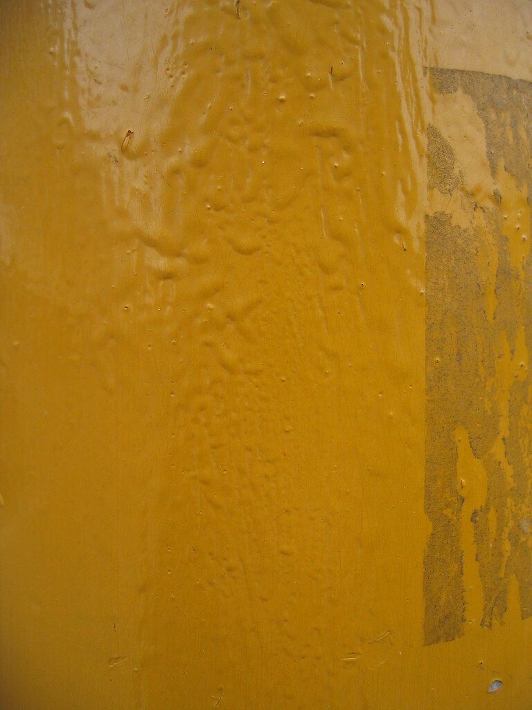 Yellow paint, close up.