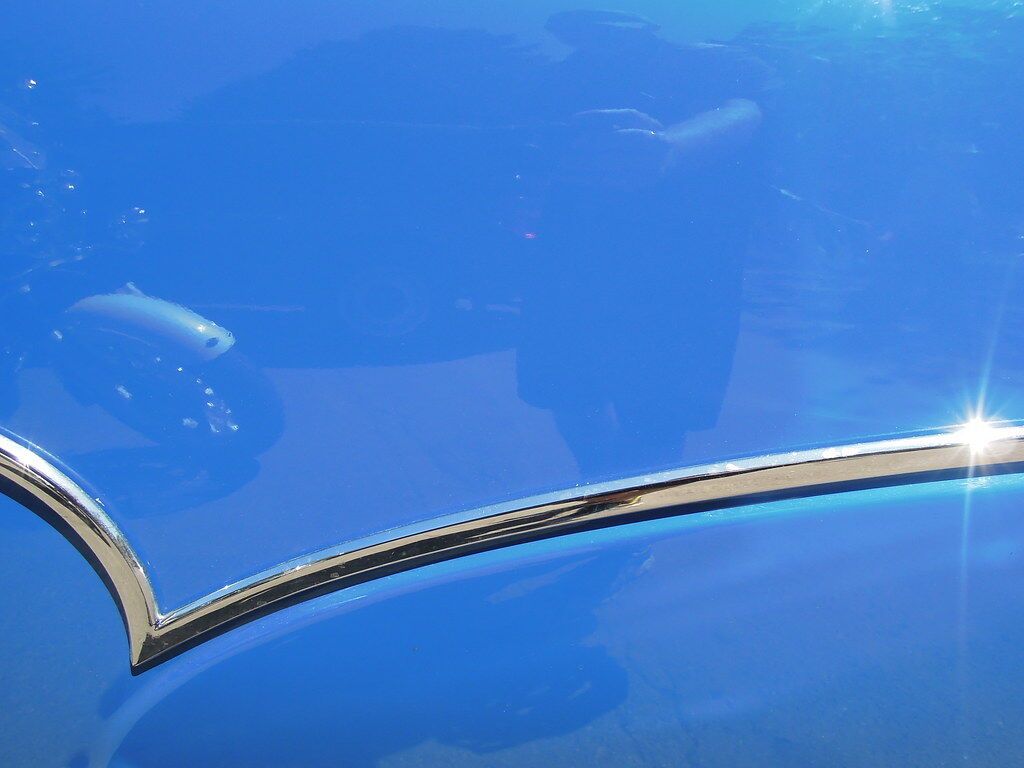 Blue paint and a line of chrome.