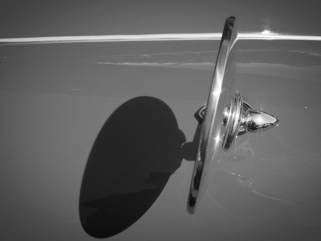A chrome mirror and its shadow.